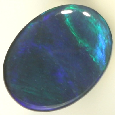 SOLID BLACK OPAL Sheen pattern of turquoise to green to ocean blue